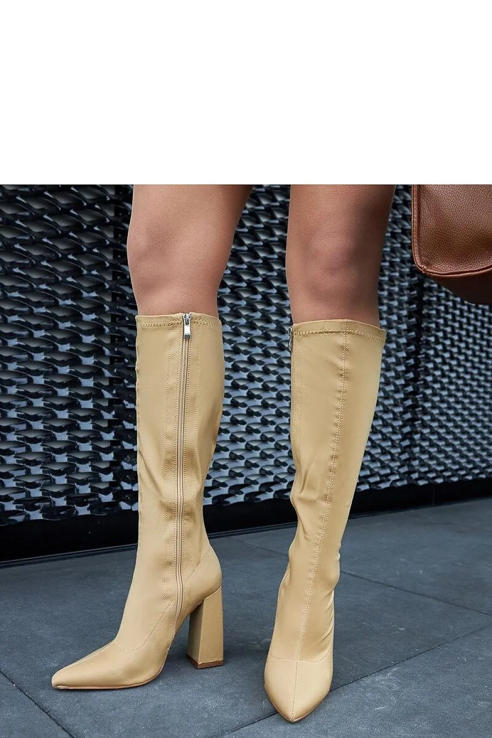 Beige high heeled knee-high boots