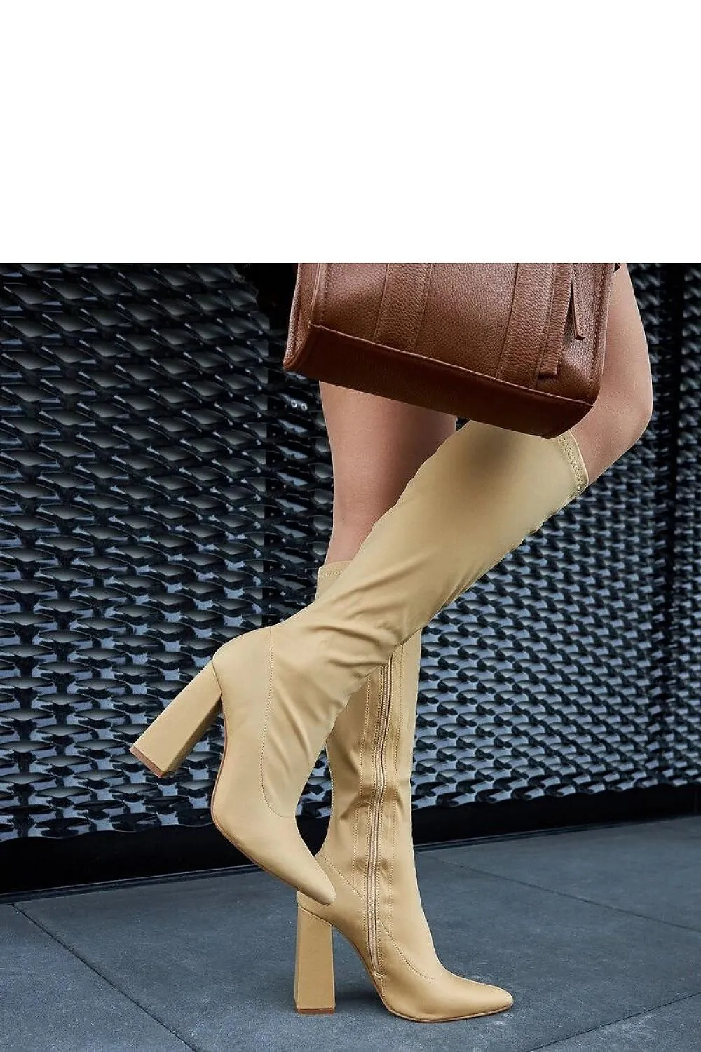 Beige high heeled knee-high boots