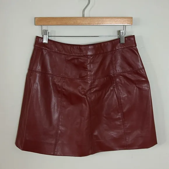 FREE PEOPLE Maisie Vegan Mini Skirt in Double Dare Burgundy Snap Front Sz 10 NEW