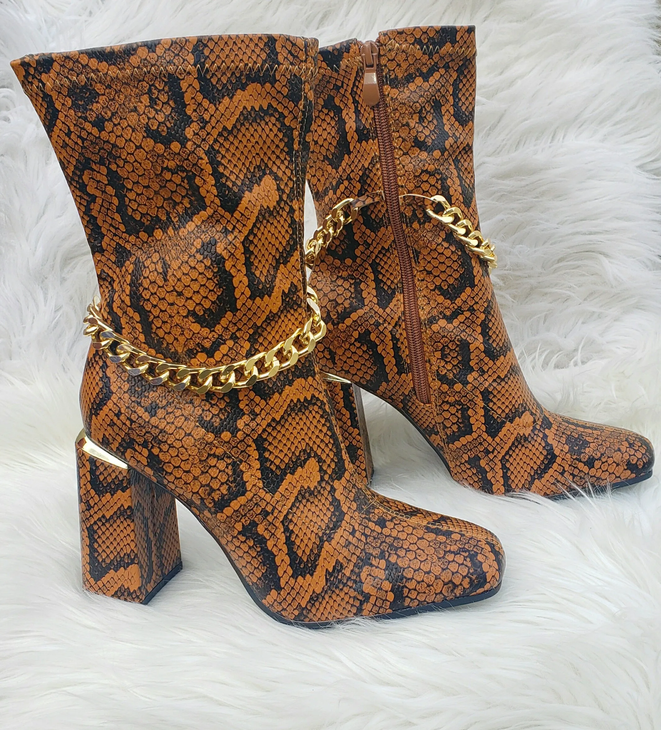 Tamed Snakeskin Boots